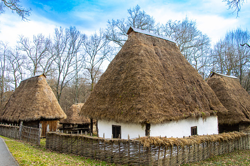Romanian traditional house at Sibiu Astra National Museum. The museum is located on a large site just outside Sibiu. It is described as the largest outdoor museum in Europe. It is located in Sibiu, Romania