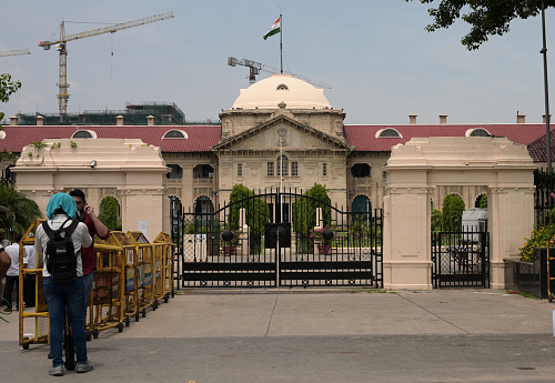 A general view of High court of Allahabad  building from outside in Prayagraj. Allahabad High court is one of the oldest High court of India. Now it is  situated in Prayagraj, Uttar Pradesh (A northern state of India).