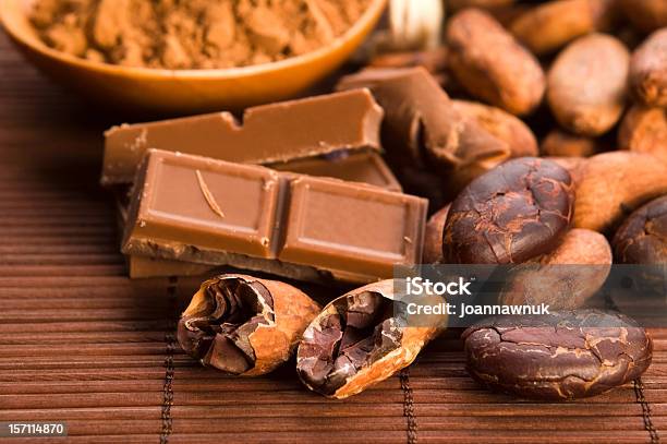 Cocoa Beans On Natural Wooden Table Stock Photo - Download Image Now - Bean, Brown, Cacao Fruit