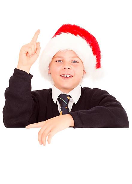 Schoolboy over a blank sing. stock photo