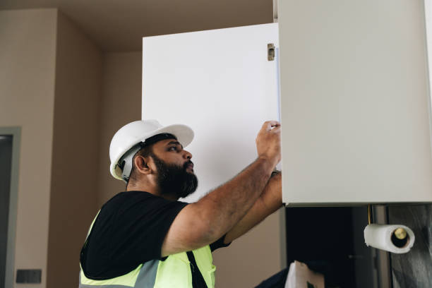 istock Electrician checking on the electric circuit board 1571179872