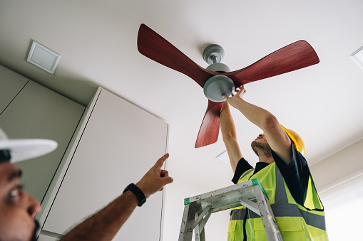 The technician tested the fan's functionality, making sure it operated smoothly and silently.