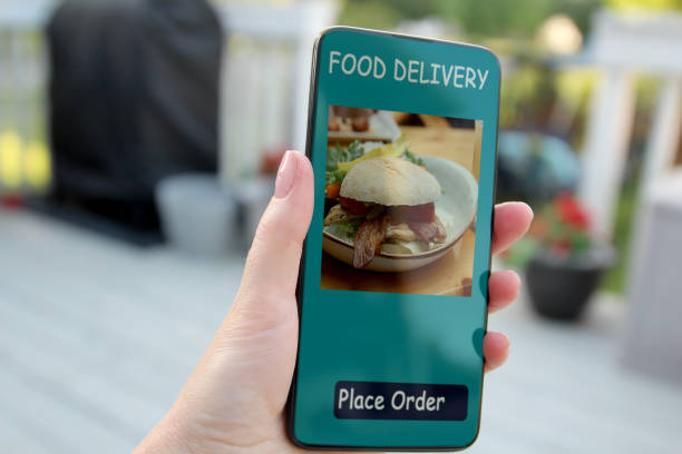 istock Woman is ordering  food on  the internet using an app. 1571188313