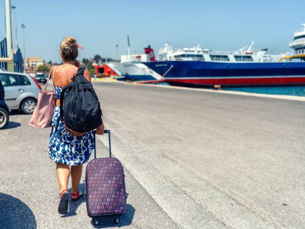 Passenger female disembarking from a Greek ferry