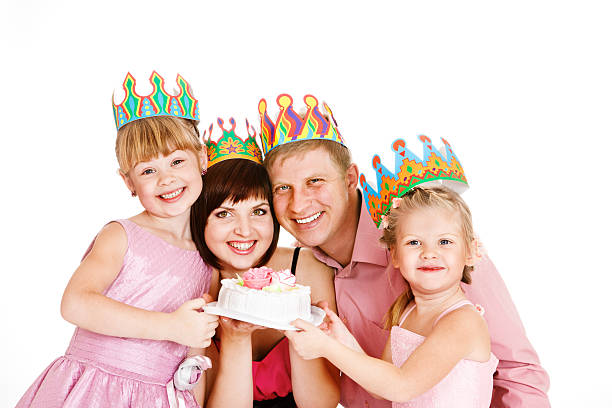 istock Parents and daughters holding a cake 157123917