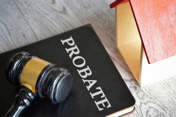 istock Toy house, gavel and text PROBATE. 1571283373