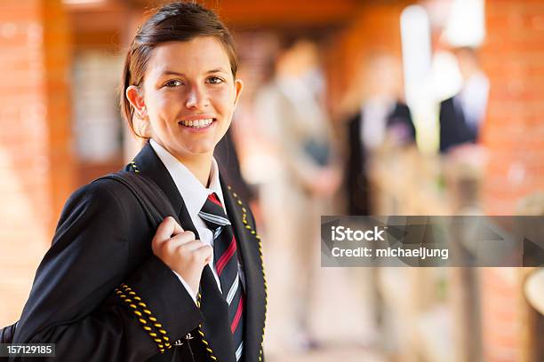 A High School Female In Blazer And Striped Tie Stock Photo - Download Image Now - High School Student, Uniform, School Uniform