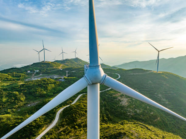 istock Wind farm on the mountain, blue sky and white clouds 1571293381