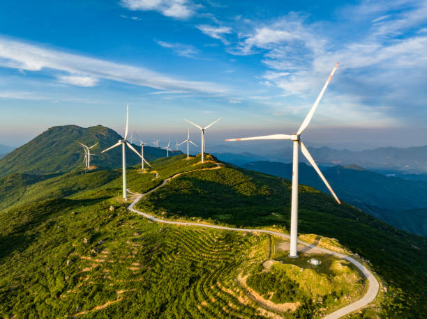 Wind farm on the mountain, blue sky and white clouds