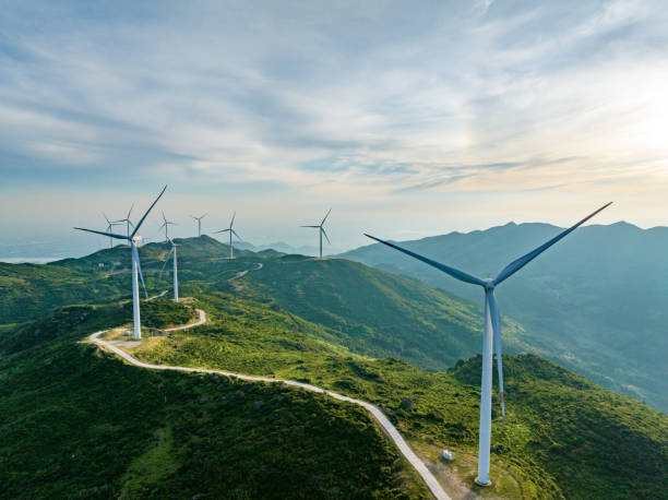 istock Wind farm on the mountain, blue sky and white clouds 1571298193