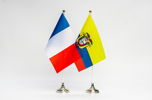 National flags of France and Ecuador on a light background. Flags.