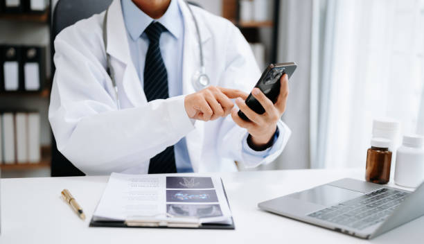 istock Medicine doctor hand working with modern digital tablet computer interface as medical network concept 1571341363