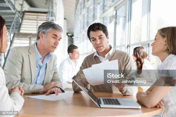 Business Colleagues In Meeting Stock Photo - Download Image Now - 20-29 Years, 30-39 Years, 35-39 Years