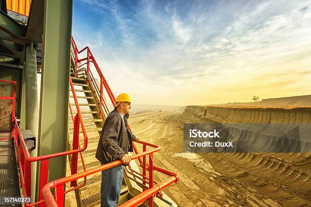 Happy Worker On Drill Machine Stock Photo - Download Image Now - Mining - Natural Resources, Engineer, Technology