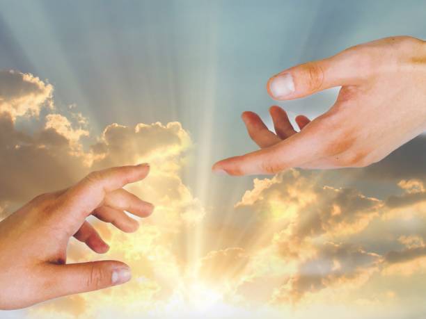 istock Human Hands Reaching Out Against Heavenly Sky Inspiring Conceptual Image • Death Calling Upon Higher Power Faith in God 1571409791