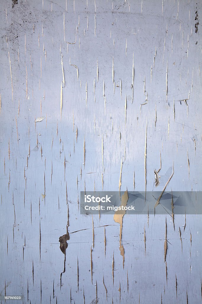 Grietas pared de pintura azul - Foto de stock de Agrietado libre de derechos