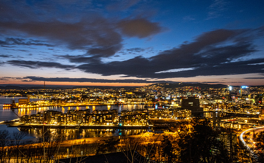 The citylights of Oslo, Norway from the Ekesberg sculpture park viewpoint.
