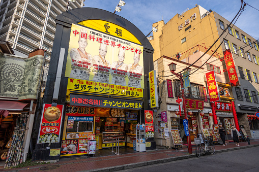 Yokohama, Japan - June 29, 2023 : General view of the Yokohama Chinatown in Yokohama, Japan. It is Japan's largest Chinatown and one of the most popular tourist destinations in Yokohama, with many Chinese stores and restaurants on the narrow and colorful streets.