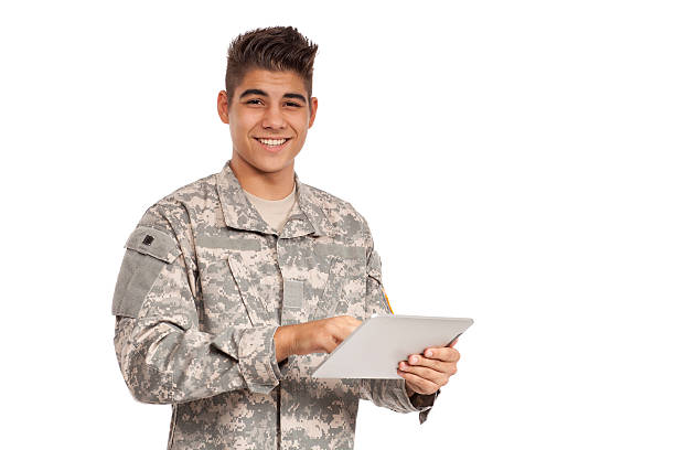 istock Happy Soldier typing on a tablet 157145027