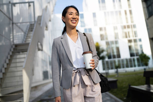 istock Businesswoman in financial district 1571452511