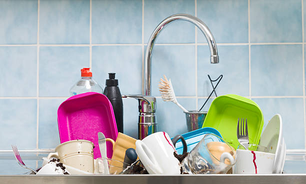istock Messy kitchen with dishes in the sink 157145304