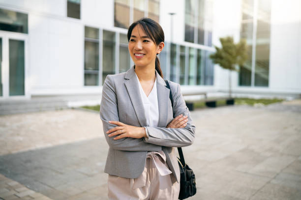 istock Businesswoman in financial district 1571457938