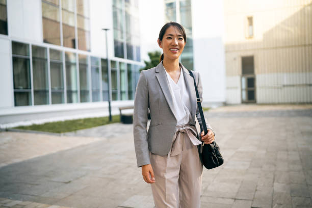 istock Businesswoman in financial district 1571458854