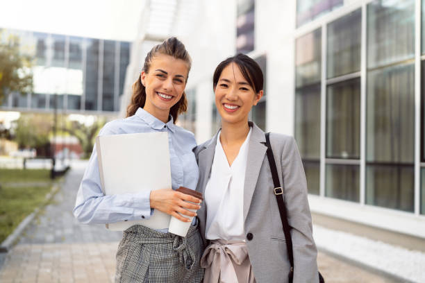 istock Two business women in financial district 1571462297