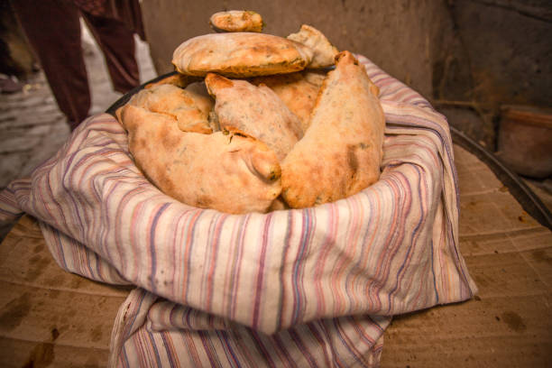 istock Bitschak - the stuffed dumplings in the bowl in the tablecloth 1571473612