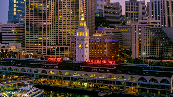 Aerial view of San Francisco Ferry Building in city during dusk San Francisco, California, USA.