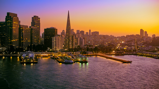 Aerial view of modern skyscraper buildings in city during dusk, San Francisco, California, USA.