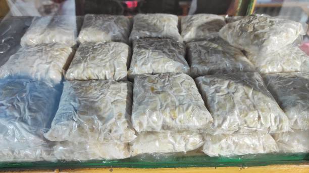 istock Raw tempeh displayed in storefront of restaurant to attract the customers 1571495308
