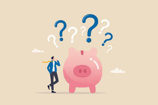 Finance question or saving problem, doubt or confusion, banking or economic uncertainty, contemplation or money solution, wealth concept, confused businessman with piggybank and question marks.