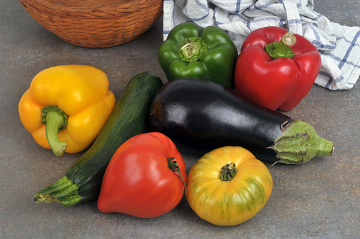 Assortment of vegetables close-up on a gray background