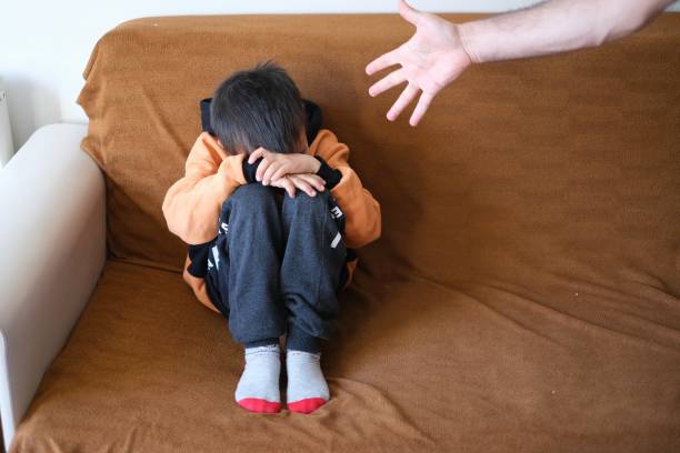 istock Little boy pissing off his father 1571546392