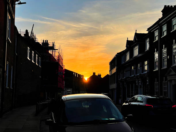 istock Sunset on a city street 1571562851