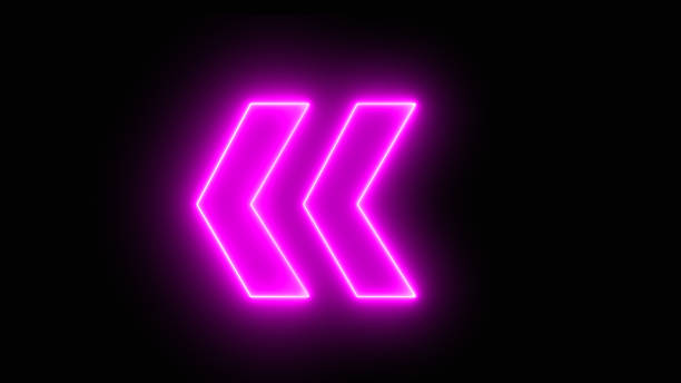 istock Glowing purple neon light arrows pointing to the left. Flashing direction indicators. 1571575349