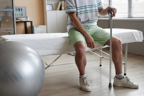istock Patient sitting in doctor office 1571579631