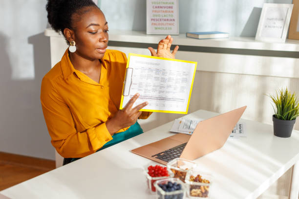 istock African Nutritionist Talking About Dieting Plan With Her Client Online 1571589873