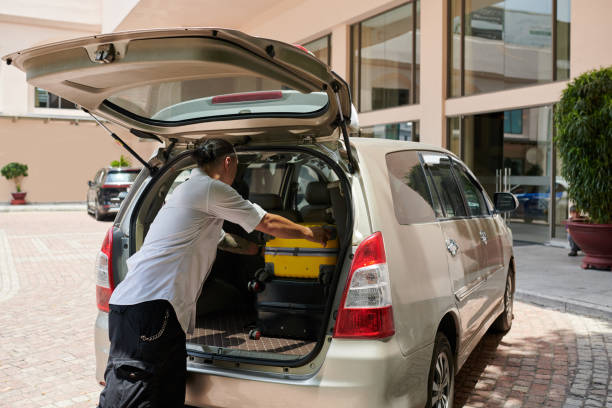 Loading Off Car 250+ Unloading Car At Airport Stock Photos, Pictures & Royalty-Free ...