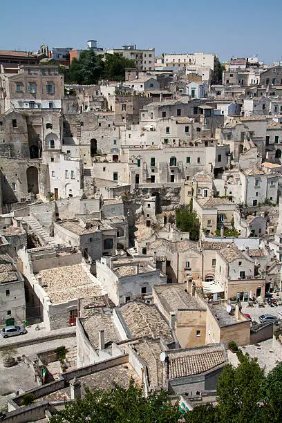 Cityscape view of Sassi di Matera, toward sasso Barisano, during a summer sunny day.