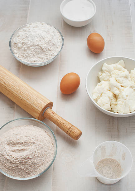 istock Flour  with eggs, ricotta cheese and rolling pin 157160973