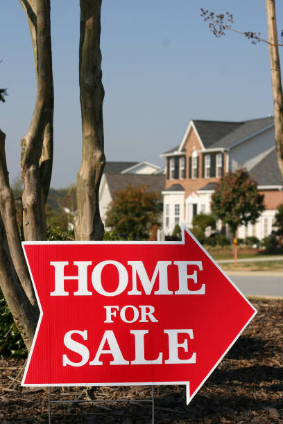 istock Home for Sale Arrow Sign Vertical 157162788