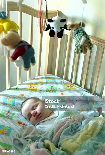 Baby Boy Asleep In His Crib Stock Photo - Download Image Now - Baby - Human Age, Blanket, Boys