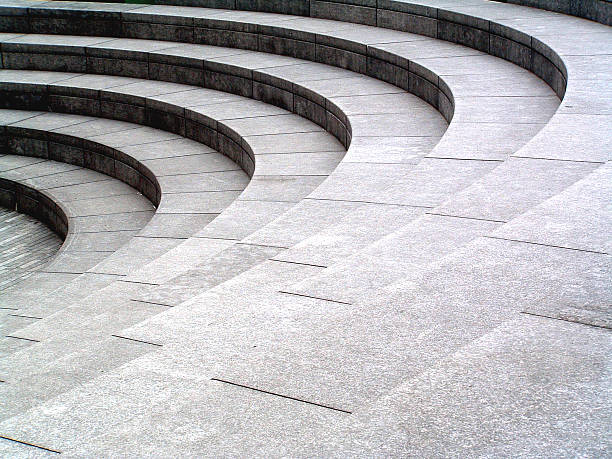 gris piedra, pasos de fondo de textura curva de granito - amphitheater fotografías e imágenes de stock