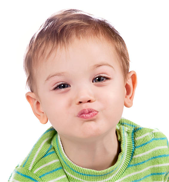 istock kissing baby boy 157163116