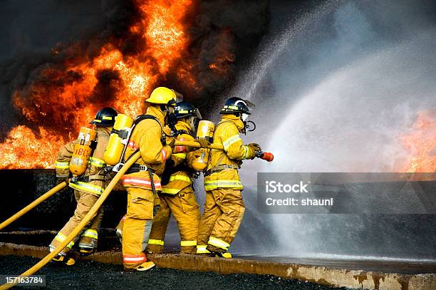 Fire Fighting Stock Photo - Download Image Now - Firefighter, Fire - Natural Phenomenon, Education Training Class