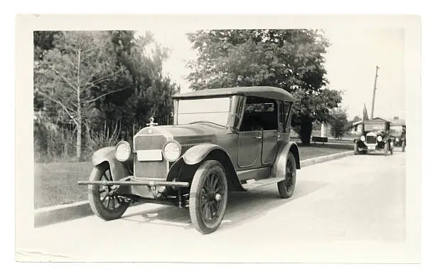 Photo of Black and White Photo of an Old Car