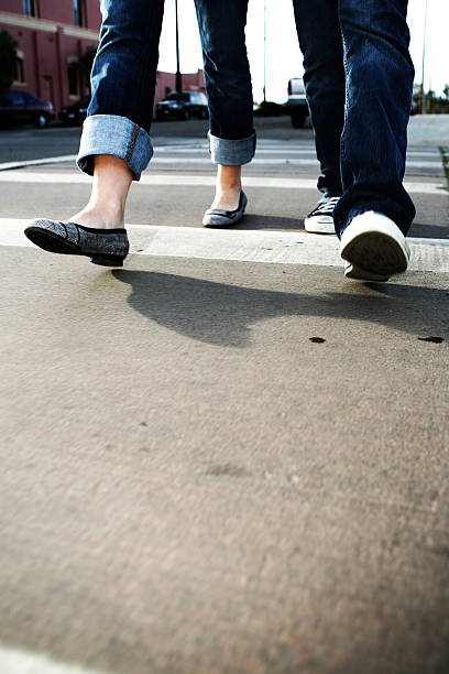 istock Couple Crossing the Cross Walk 157165247