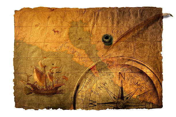 old map with ship and compass shallow depth of field